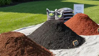 Fresh brown, black, and red mulch color selection for landscaping in Omaha, NE by Chop Chop Landscaping